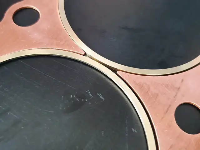 Bullet Race Engineering RB26-30 fire ring head gasket kit, close-up of the copper gasket and fire rings.
